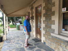 David knocking on Mount Bryan Hotel door